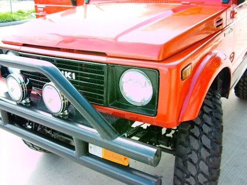 Gorgeous red 1987 suzuki samurai 4x4, loaded jx model, built like new!