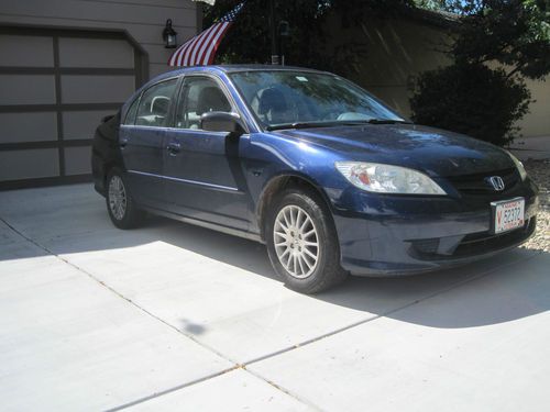 Blue 4d sedan, manual transmission, civic lx se, 6 disc/mp3, 15"alloy wheels, ac