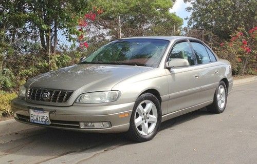 Very clean silver cadillac catera 2000 67,000 miles