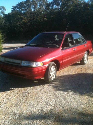 1991 merc. tracer. 4 cly. 5 spd 30 mpg. 133k.