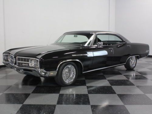 Excellent paint, lots of aftermarket stereo equip, cold a/c, clean buick