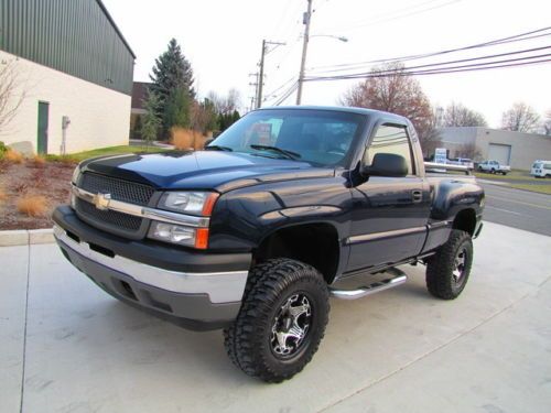 Lifted 4x4! step bed ! serviced! new tires !dvd/lcd premium sound !no reserve!05