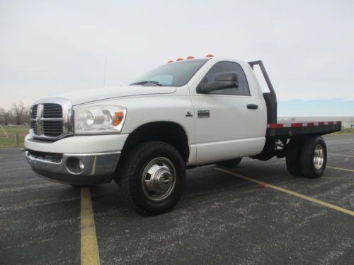 Cummins diesel, manual, regular cab, flat bed, four wheel drive