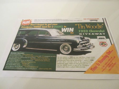 1952 chevy tin woody wagon ,2004 goodguys giveaway car,dark green tan interior.