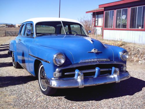Royal blue, ivory top ,1952 plymouth cranbrook,two door coupe,all new upholstery