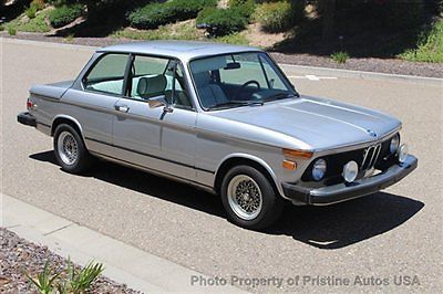 1976 bmw 2002, 5-speed, a/c, no reserve highest bidder wins. not actual miles.