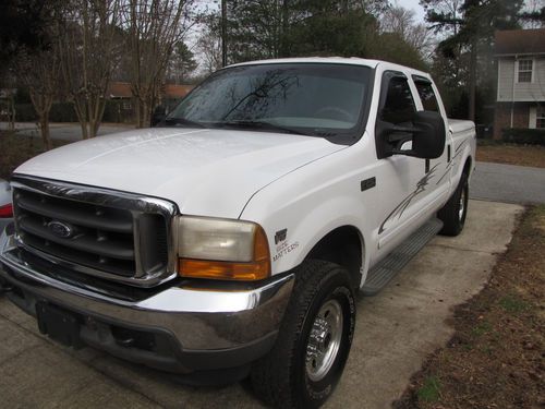 2001 f250 super duty crew cab, 4x4, must see, great mileage!  no reserve!