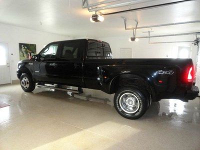 Black lariat diesel 6.0l cd 4x4  dual rear wheels 21000 miles leather