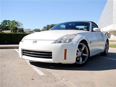 350z,6 speed,roadster grand touring,leather heated seats,xenon head lights,gr8!!