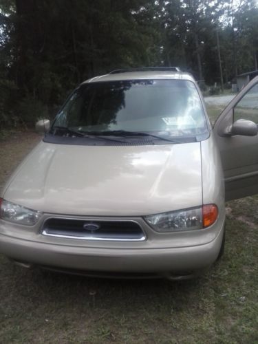 1998 ford, windstar limited, mini-van, 7 seater, color-gold/gold