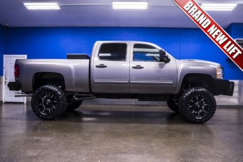 Lifted 6.6l duramax diesel crew cab bed liner steering wheel ctrls power locks