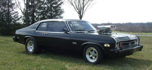 Black chevy nova drag car