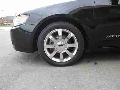 v6 navigation CD financing available heated cooled seats chrome wheels sunroof, image 21