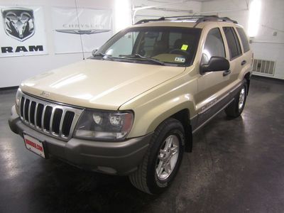 Classic tan 2000 jeep grand cherokee laredo