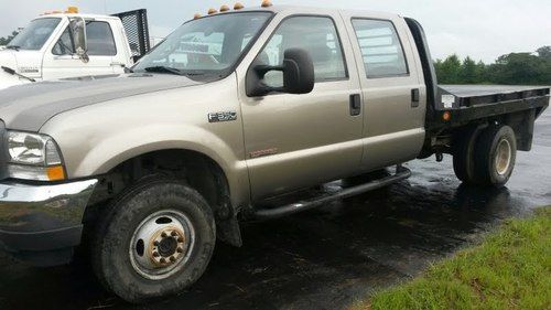 2004 ford, diesel, 6 speed, 4x4, 4 door flatbed, no reserve