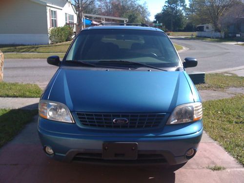 Blue van good condition, all power options, 4door