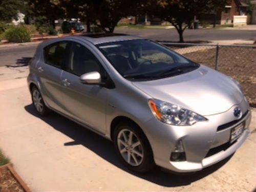2012 toyota prius c four base hatchback 4-door 1.5l 5,700 ml  set of snow tires
