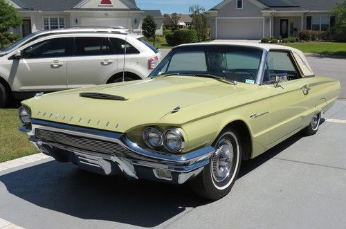 1964 thunderbird, perfect condition,florentine green w/white landau top,all work