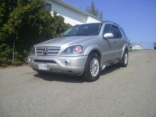 2002 ml 55 amg  low miles like dinan x5 q7 super suv no reserve