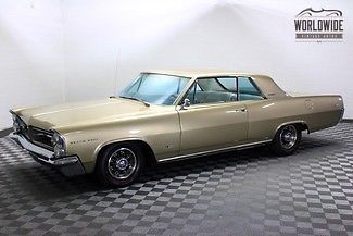 1963 pontiac grand prix. fully restored! hurst equipped! fact a/c! royal bobcat!