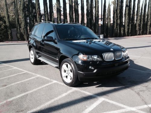 2006 bmw x5 black great condition 4.4l sport package, loaded, clean and ready!!!