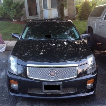 2005 cadillac cts-v, 153, 245 highway miles.  black on black with sunroof.