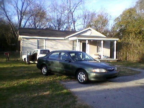 1999 mazda 626 lx sedan 4-door 2.0l