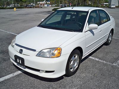 2003 honda civic hybrid,auto,pwr windows,cold a/c ,please read ad