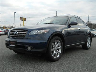 We finance! awd sport touring bose heated seats chrome 20's carfax certified!