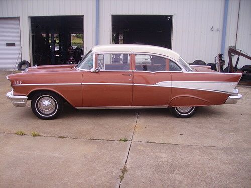 1957 chevy bel air 4 door 283 v8 3 speed manuel trans.  runs good very solid car