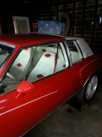 Red monte carlo with a 454 engine. white and red interior.