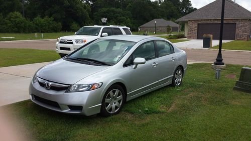 Silver honda civic lx sedan