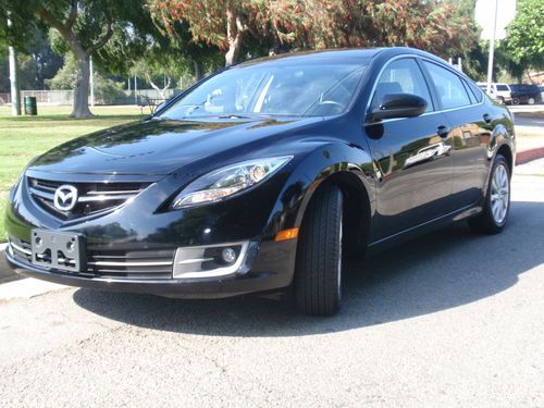 2012 mazda 6 itouring.  black on black. bluetooth, brand new brakes, etc.