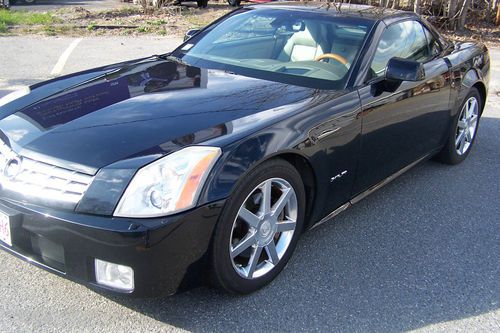 2004 black hardtop convertible w/ cream interior