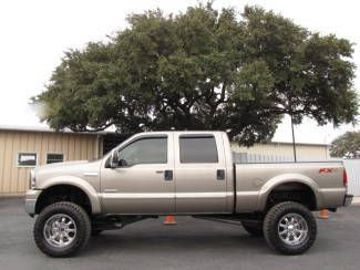 Lifted lariat leather sunroof pioneer nav 6.0l powerstroke diesel v8 4x4 fx4!