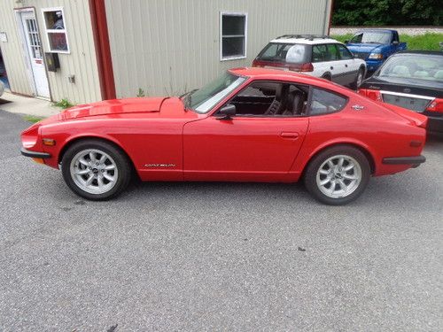 1971 datsun 240z race car, red in color, 5 speed, 280zx engine in-line 6