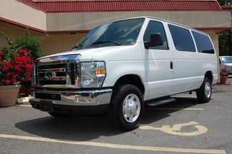 Very nice 09 model ford 12 passenger van, with running boards &amp; rear park aid!