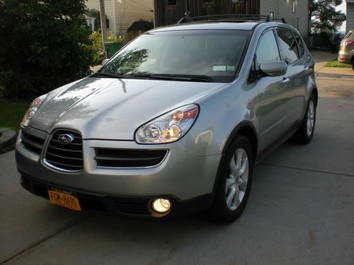 ,awd suv, excellent condition, tow pkg, 53,000 low miles, grey on grey