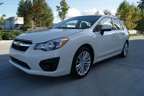 2013 subaru impreza wagon. 2.0l engine. over 30mpg. awd! 13k miles. sunroof