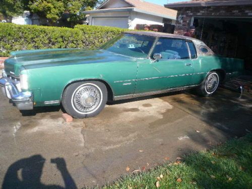 73 olds toronado, 33k orig. miles, new engine, nr!! loaded with options. calif.