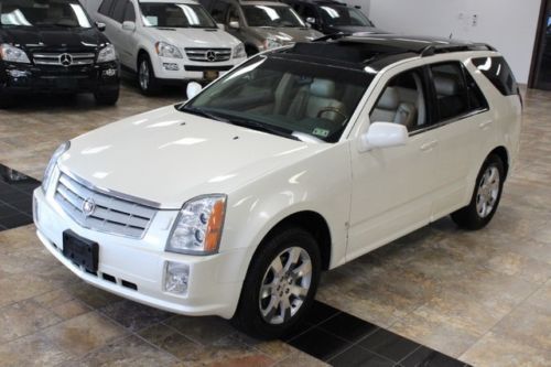 2007 cadillac srk~pana roof~nav~dvd~heated seats~3rd row~only 75k