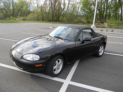 Black convertible mazda miata