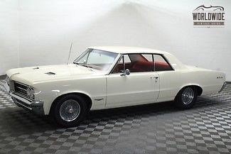 1964 pontiac gto 389 v8 with 4 speed and factory tach!