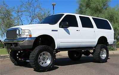 No reserve 2000 ford excursion lifted 7.3l diesel 4x4 low mile beauty  az clean