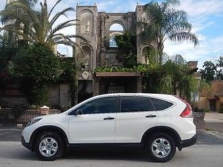 2013 white cr-v with eco booster installed, back up camera and great on gas!!