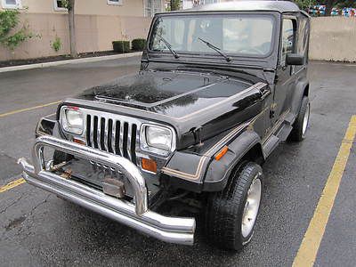 Sahara auto 4x4 low miles 99k looks and runs good soft top