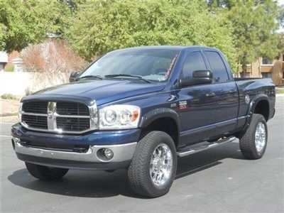 2500 hemi powered 4wd  this truck is a stud with only 49k