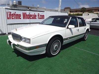 Fl 1990 cadillac seville in white w/blue top runs great 80k miles newer tires!