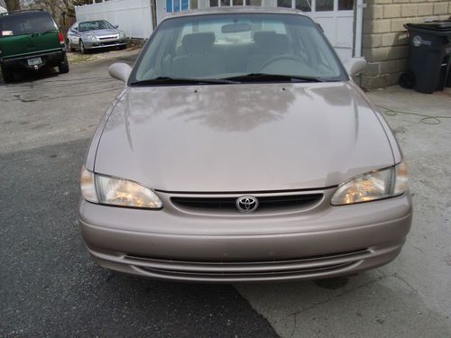 2000 toyota corollale 5 speeds 4cyl 1.8l engine,great sharp,one owner vehicle