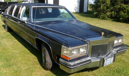 84 cadillac fleetwood limo, dark blue, sun roof, bar, lots of fun